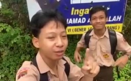Tangkapan layar konten vidio kampanye dua anak di bawah umur yang masih berseragam sekolah di Desa Trirejo, Kabupaten Purworejo, Jawa Tengah. (Jateng Memanggil/Antara) 