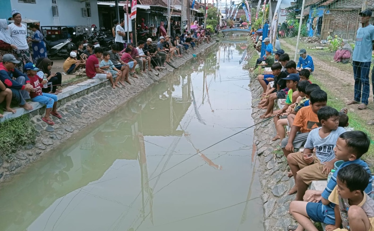 Keterangan: peserta lomba mancing Ranting Kebonharjo I,di Sungai Reyeng Kendal, Minggu 26/10/2025. (Ist/Jateng Memamggil)
