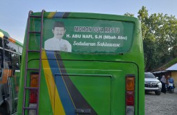 Penampakan bus antar kota di Blora dibranding wajah mantan Wakil Bupati Blora yang saat ini menjabat sebagai anggota DPRD Provinsi Jawa Tengah, H Abu Nafi. (Memanggil.co/Ist)