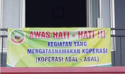 Banner yang dipasang di sejumlah pasar daerah oleh Dindagkop UKM Kabupaten Blora. (Memanggil.co/Ist) 