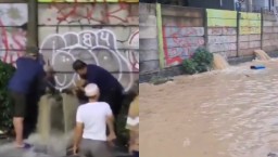 Warga yang melubangi tembok pembatas Perumahan Grand Galaxy, Jalan Raya Pekayon, Kota Bekasi (Memanggil.co/tangkapan layar)