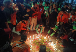 Lilin di Depan Proyek Sekolah Rakyat: Duka dan Tuntutan Keadilan untuk Driver Ojol Tuban